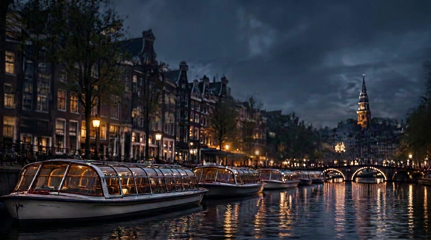 Canal tour boats in Amsterdam at dusk